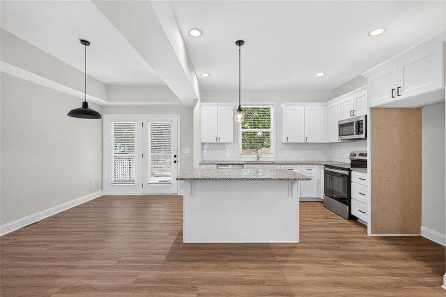 Furnished interior view inside a new home in , Monroe (Image 9).