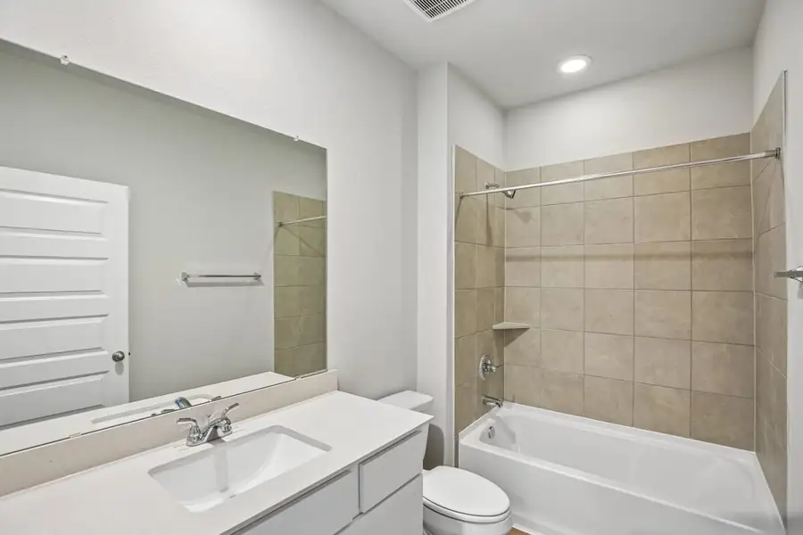 Furnished interior view inside a new home in Sorella, Tomball (Image 10).