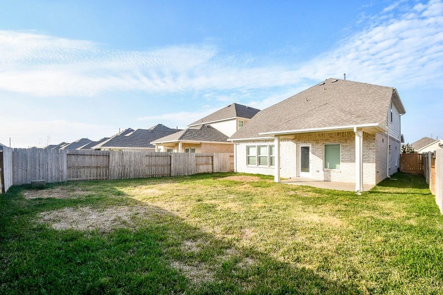 Exterior details and patio area of a home in Marvida, Cypress (Image 22).