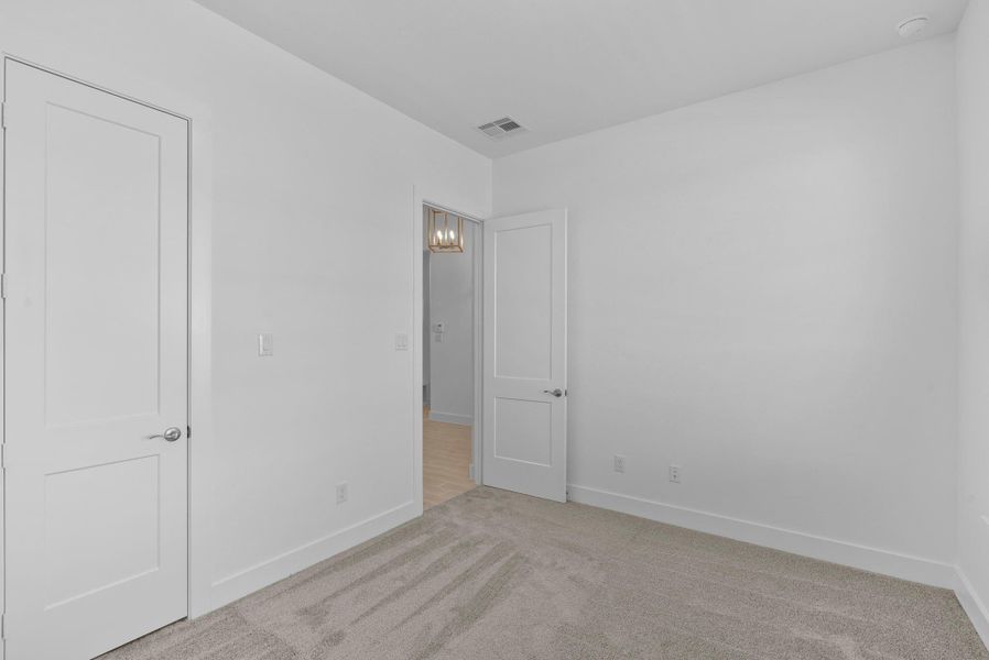Spacious, unfurnished interior of a new home in Blue Heron, Mont Belvieu (Image 15).