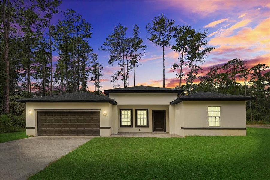Front exterior of a new home in , Ocala, FL, highlighting curb appeal (Image 2). Front exterior of a new home in , Ocala, FL, highlighting curb appeal (Image 2).