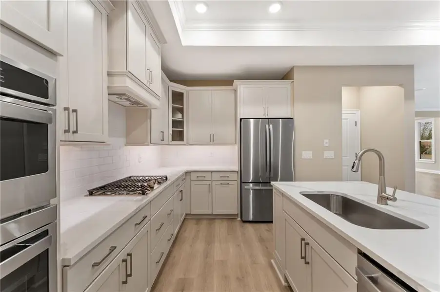 Furnished interior view inside a new home in The Courtyards at Redbud Lane, Holly Springs (Image 5).