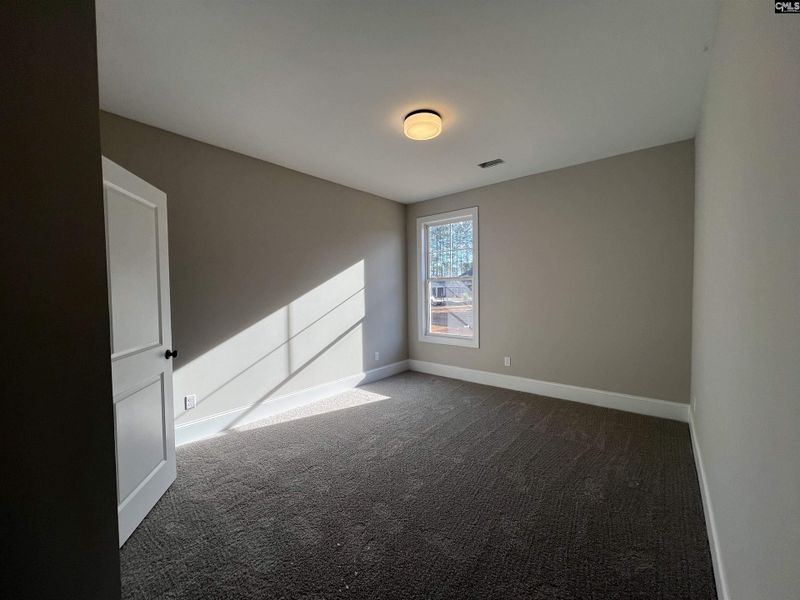 Spacious, unfurnished interior of a new home in The Cove, Sumter (Image 19).
