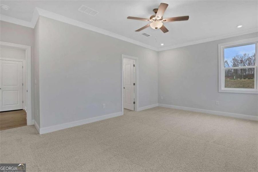 Spacious, unfurnished interior of a new home in The Paddocks at Doc Hughes, Buford (Image 41).