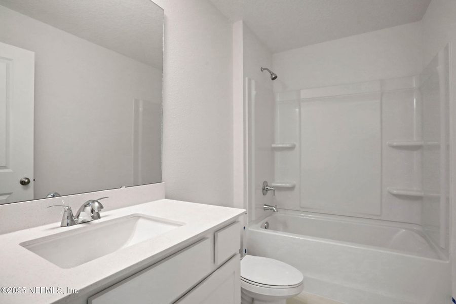 Furnished interior view inside a new home in Cordova Palms, St. Augustine (Image 9).