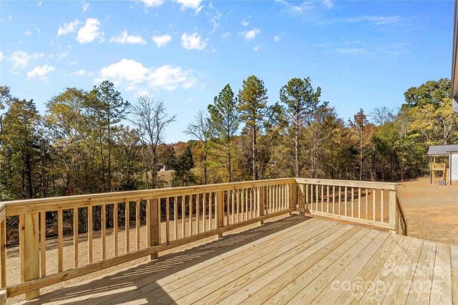 back deck w/ stairs- lot is surrounded by trees! back deck w/ stairs- lot is surrounded by trees!
