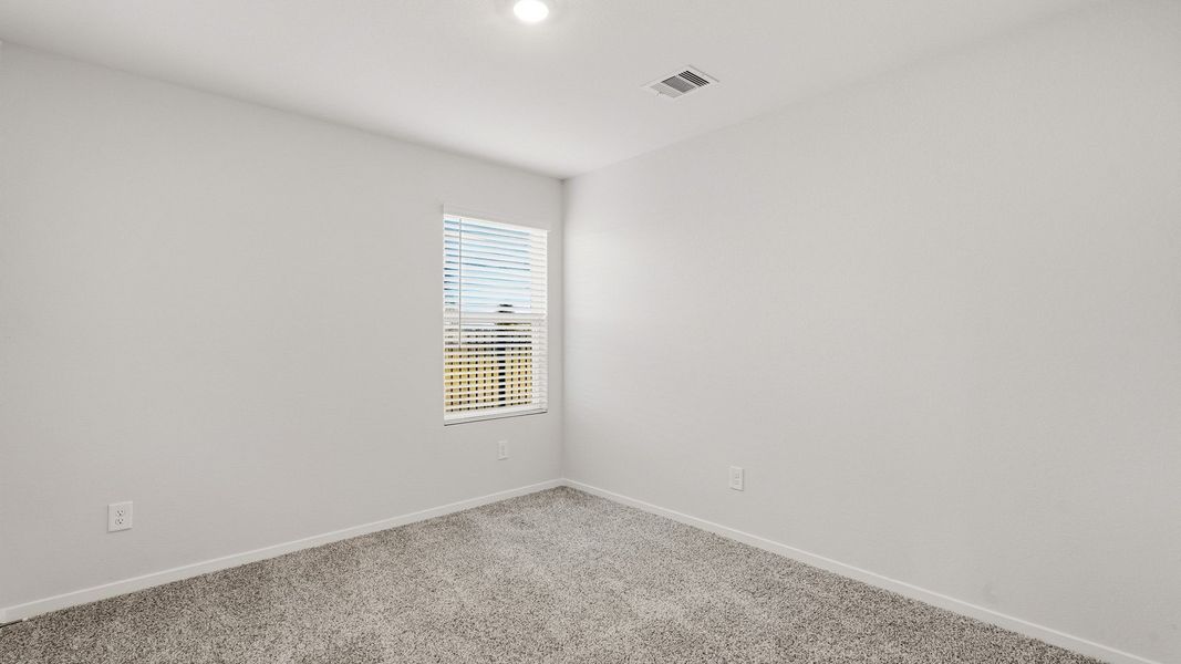 Spacious, unfurnished interior of a new home in Sunterra, Katy (Image 22).