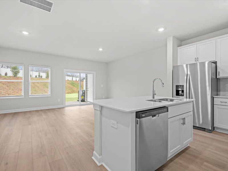 Furnished interior view inside a new home in Crossing at Abner Creek Townes, Greer (Image 7).