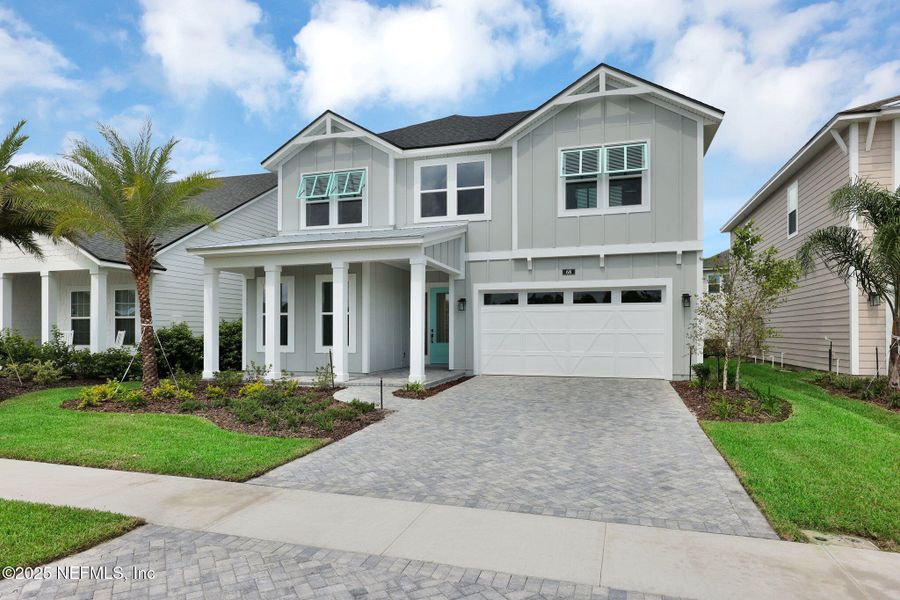 Front exterior of a new home in Seabrook Village at Seabrook, Ponte Vedra, FL, highlighting curb appeal (Image 23).