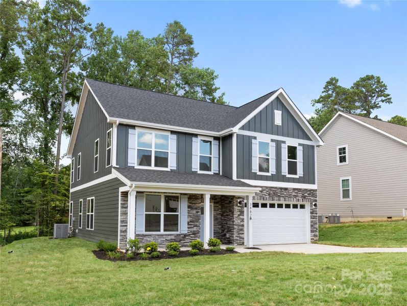 Front exterior of a new home in , Hickory, NC, highlighting curb appeal (Image 2).