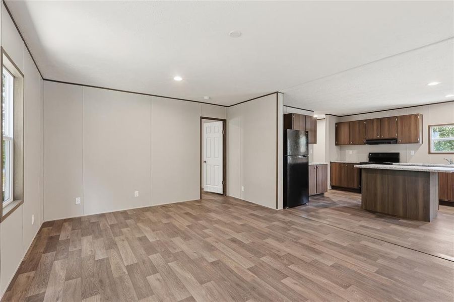 Open concept living room and kitchen area.