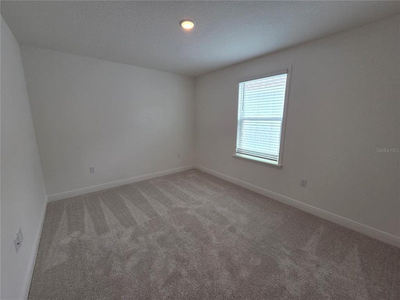 Spacious, unfurnished interior of a new home in Villamar, Winter Haven (Image 18).