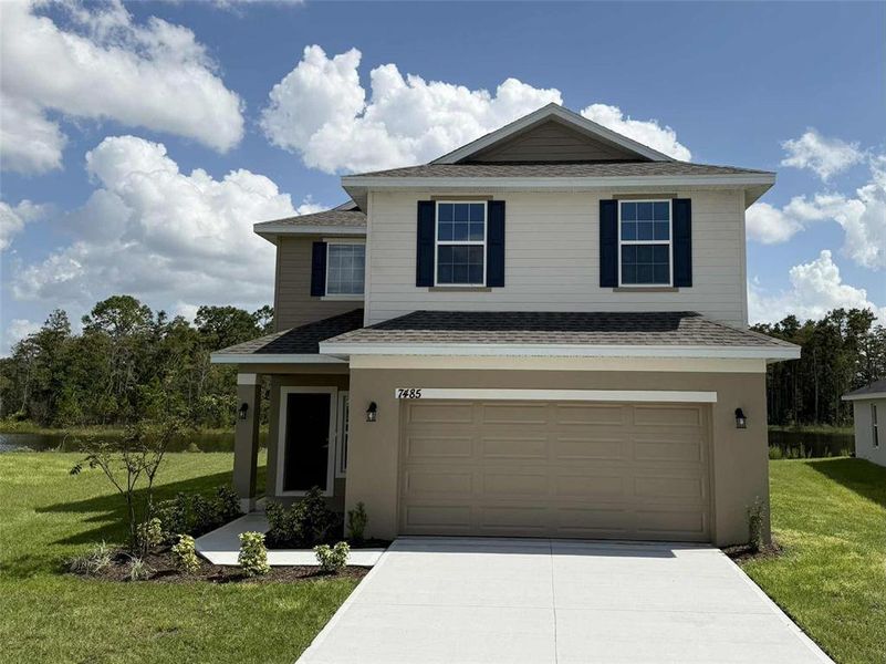 Front exterior of a new home in , St. Cloud, FL, highlighting curb appeal (Image 1). Front exterior of a new home in , St. Cloud, FL, highlighting curb appeal (Image 1).