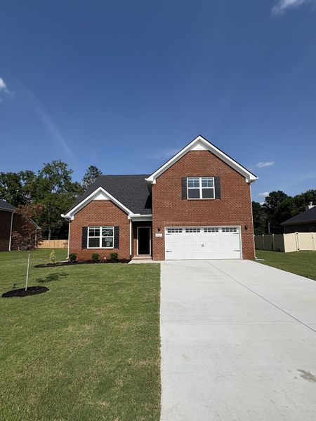 Front exterior of a new home in Rookers Bend, Smyrna, TN, highlighting curb appeal (Image 1). Front exterior of a new home in Rookers Bend, Smyrna, TN, highlighting curb appeal (Image 1).