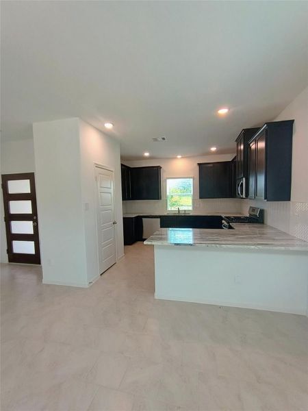 Furnished interior view inside a new home in Splendora Fields, Splendora (Image 7).