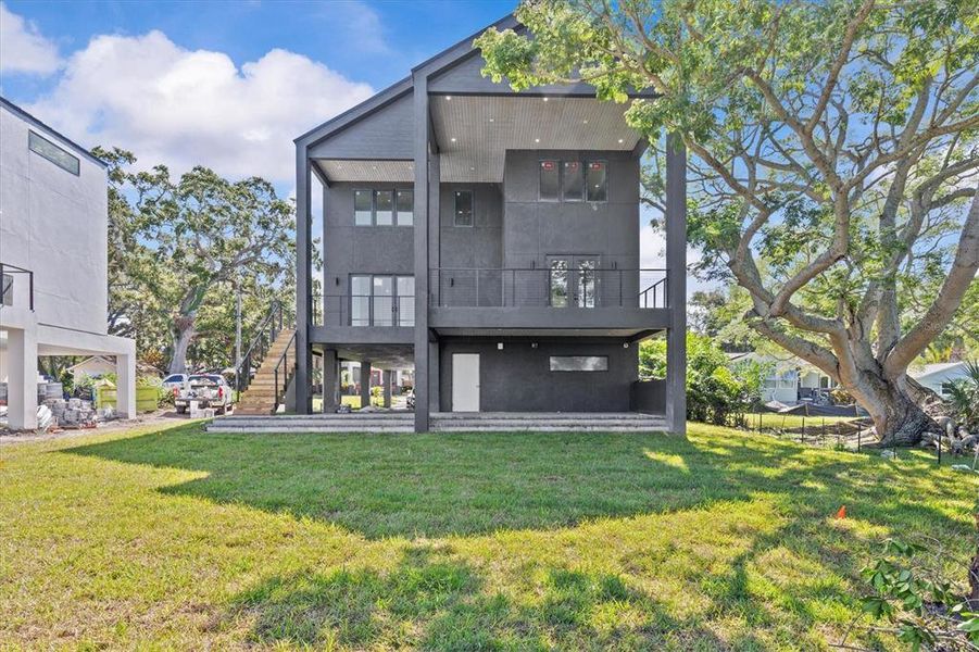 Front exterior of a new home in , Clearwater, FL, highlighting curb appeal (Image 24).