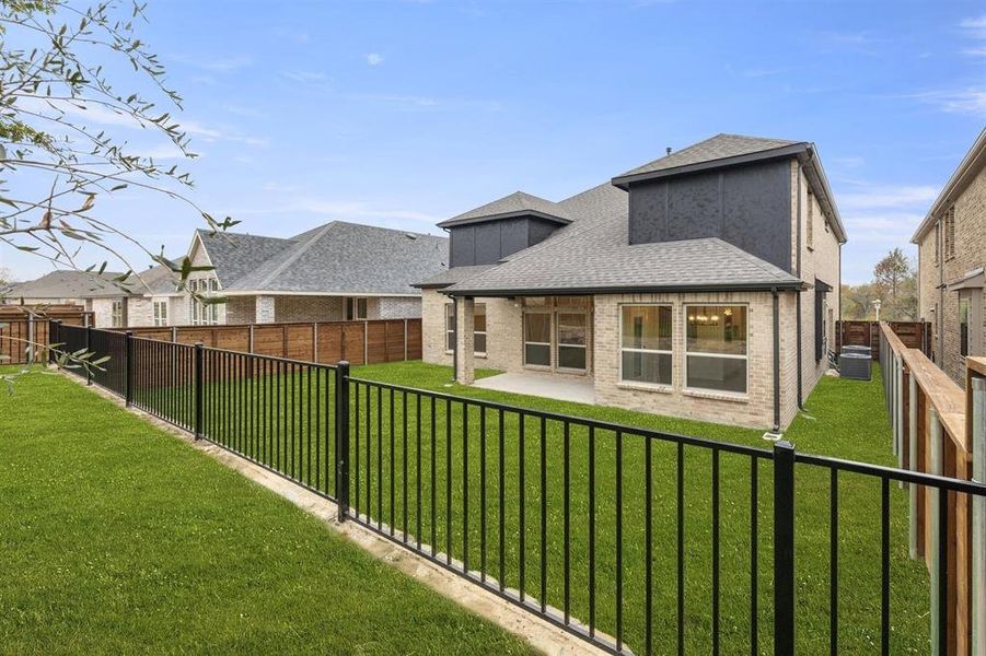 Exterior details and patio area of a home in Solterra, Mesquite (Image 22).