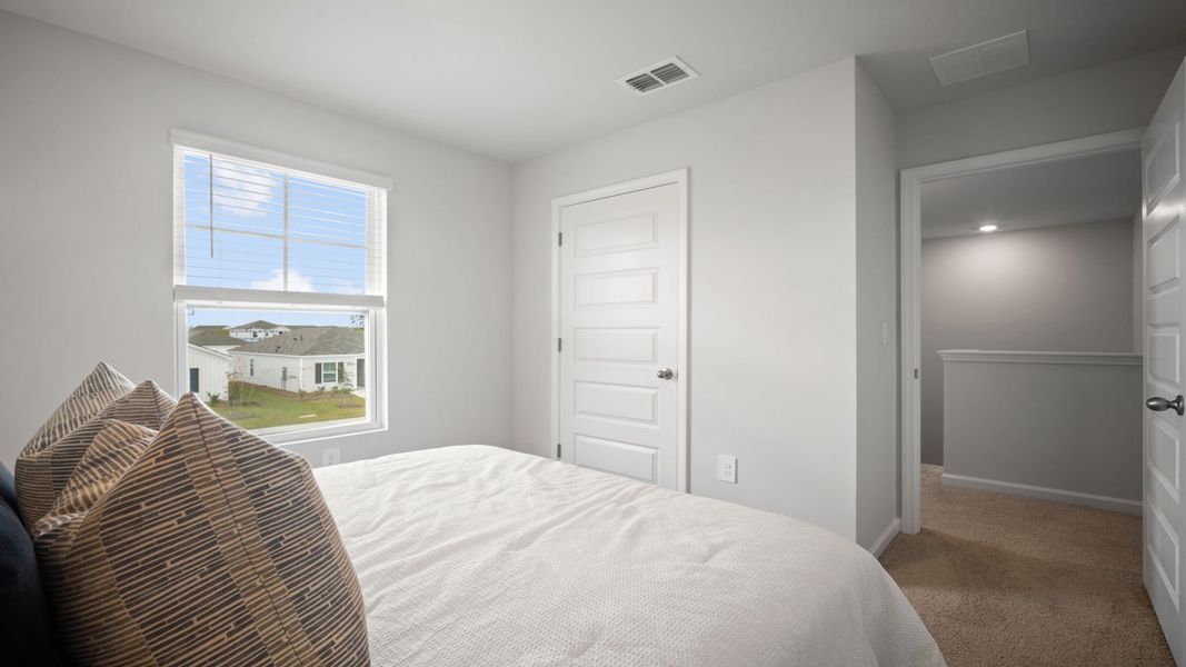 Furnished interior view inside a new home in The Groves at Bees Creek, Ridgeland (Image 25).