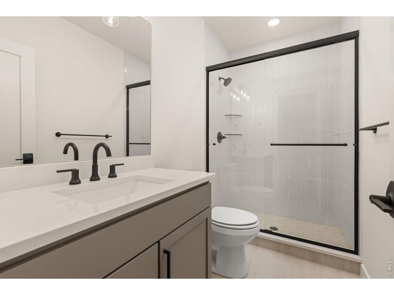 Furnished interior view inside a new home in RainDance, Windsor (Image 12).