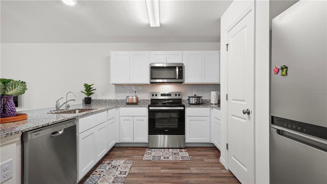 Furnished interior view inside a new home in , North Port (Image 11).