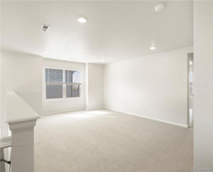 Spacious, unfurnished interior of a new home in Buffalo Highlands: The Flora Collection, Commerce City (Image 15).