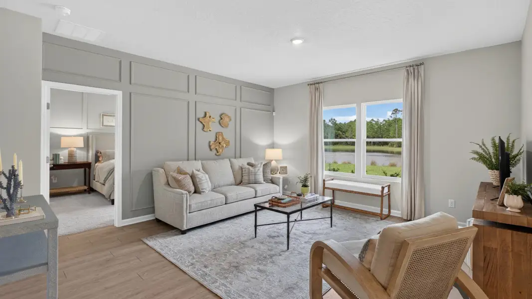 Furnished interior view inside a new home in American Village, Palm Coast (Image 11).
