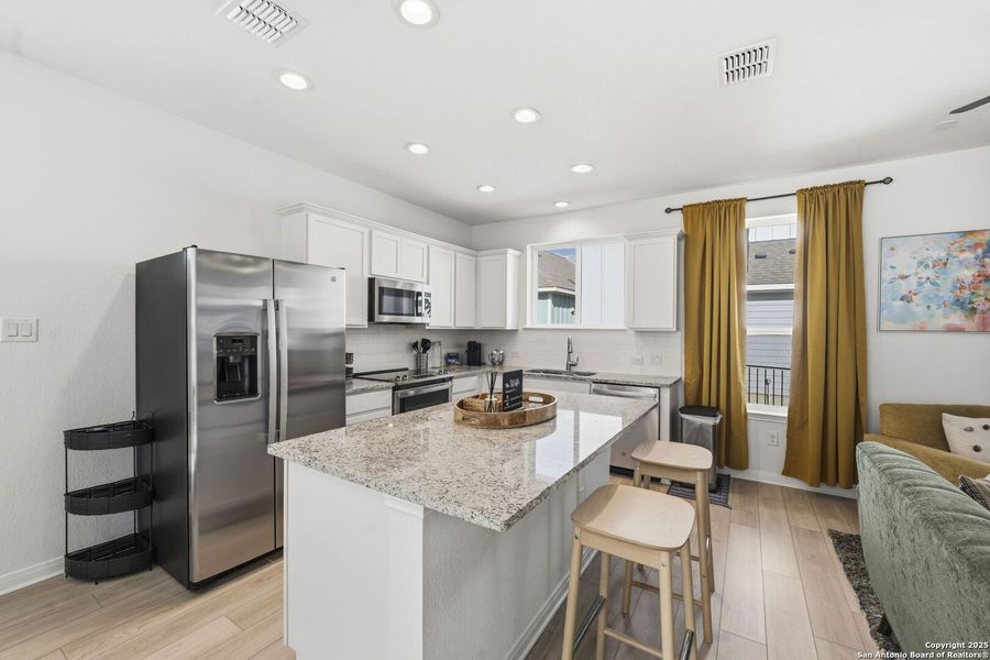 Furnished interior view inside a new home in , New Braunfels (Image 7).