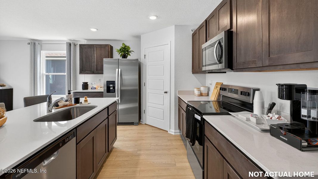 Furnished interior view inside a new home in Rookery, Green Cove Springs (Image 18).