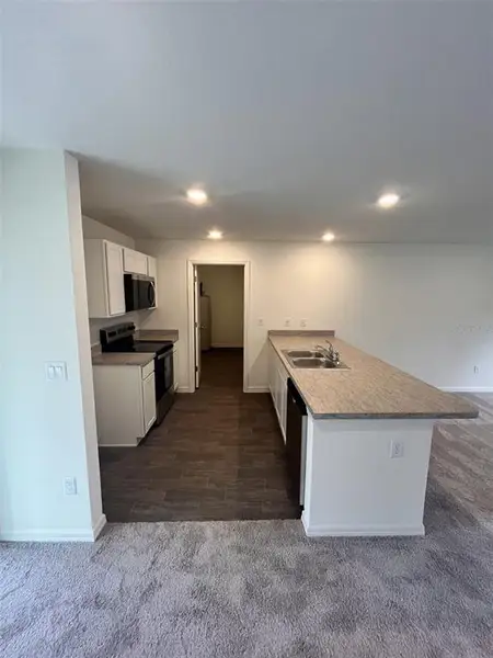 Furnished interior view inside a new home in Flagler Estates, Hastings (Image 3).