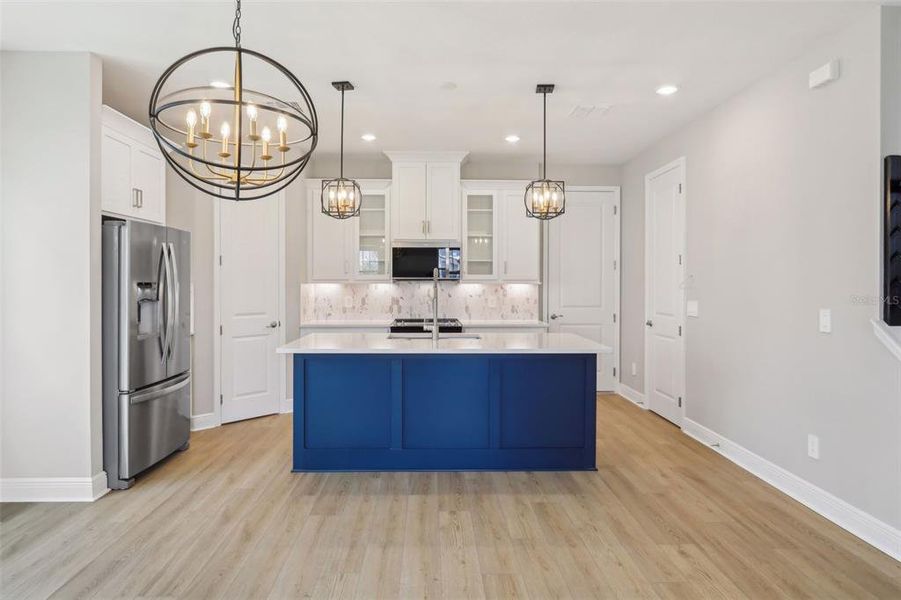 Furnished interior view inside a new home in Silverleaf Reserve Bungalows, Winter Garden (Image 7).