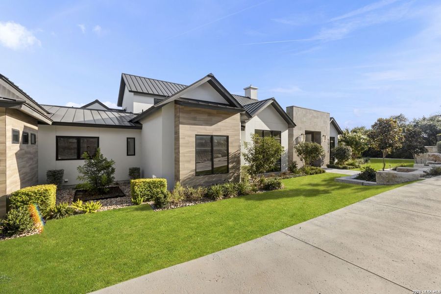 Front exterior of a new home in , San Antonio, TX, highlighting curb appeal (Image 21). Front exterior of a new home in , San Antonio, TX, highlighting curb appeal (Image 21).