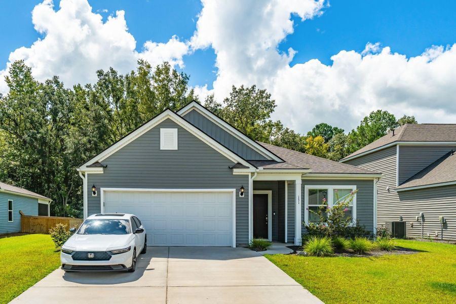 Front exterior of a new home in , Huger, SC, highlighting curb appeal (Image 25).