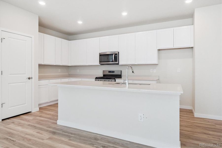 Furnished interior view inside a new home in Paired Homes at Alder Creek, Parker (Image 6). Furnished interior view inside a new home in Paired Homes at Alder Creek, Parker (Image 6).