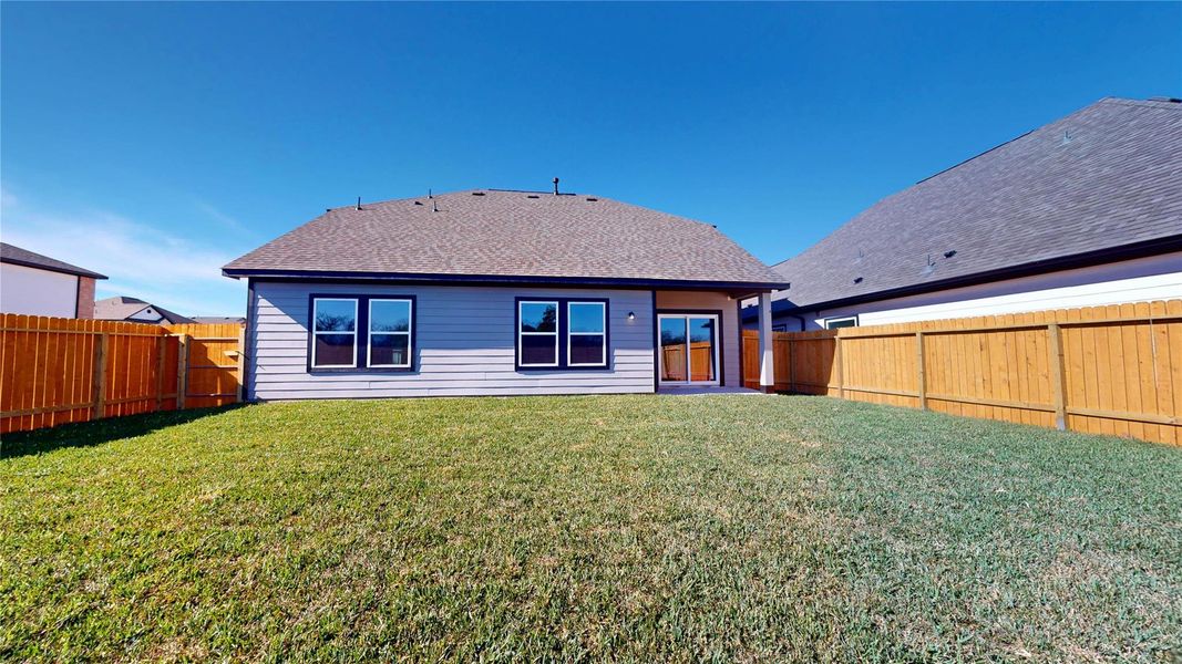 Exterior details and patio area of a home in Lexington Heights, Willis (Image 3). Exterior details and patio area of a home in Lexington Heights, Willis (Image 3).