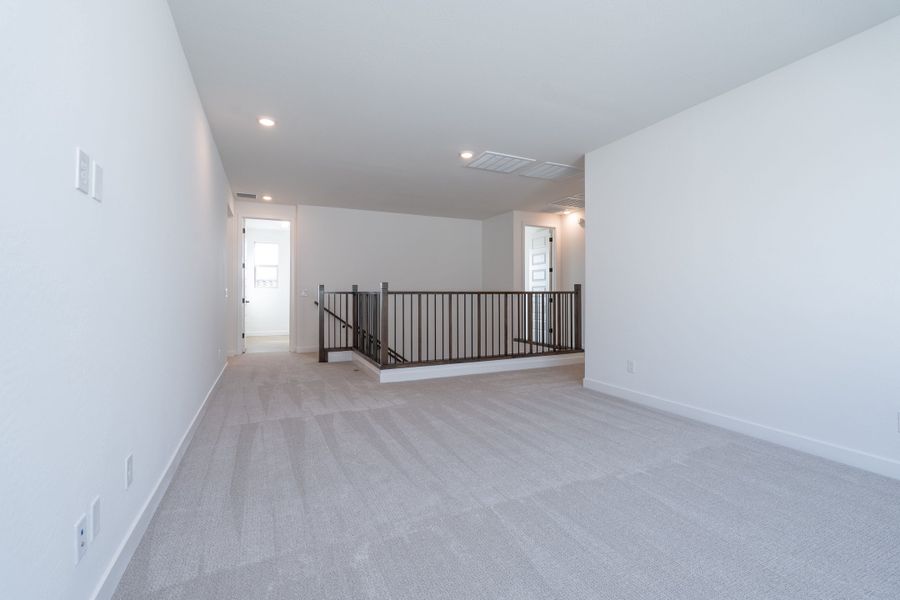 Spacious, unfurnished interior of a new home in Waterston Central, Gilbert (Image 13). Spacious, unfurnished interior of a new home in Waterston Central, Gilbert (Image 13).