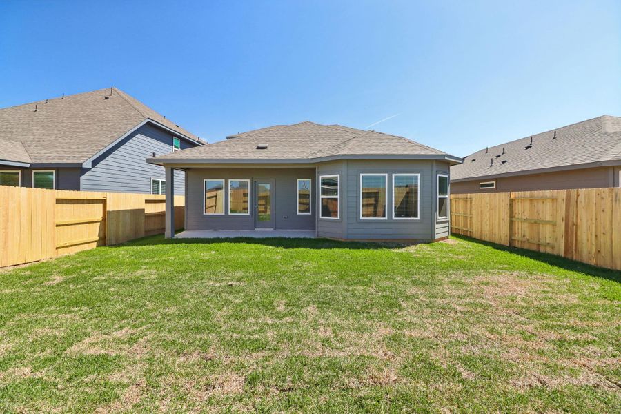 Exterior details and patio area of a home in Sanford Farms - Premier Series, Waller (Image 4).