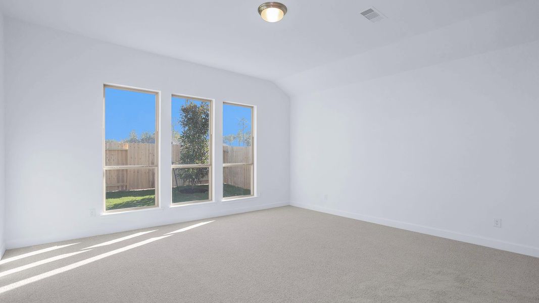 Spacious, unfurnished interior of a new home in Artavia 45', Conroe (Image 10).