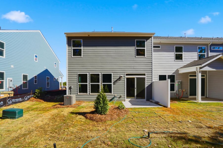 Exterior details and patio area of a home in Blythe Mill Townhomes, Waxhaw (Image 26). Exterior details and patio area of a home in Blythe Mill Townhomes, Waxhaw (Image 26).