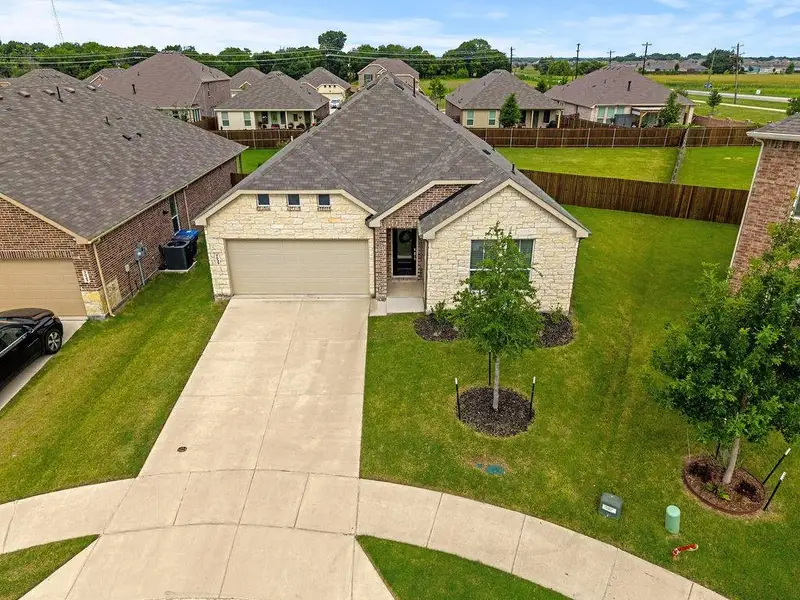 Front exterior of a new home in , McKinney, TX, highlighting curb appeal (Image 2). Front exterior of a new home in , McKinney, TX, highlighting curb appeal (Image 2).