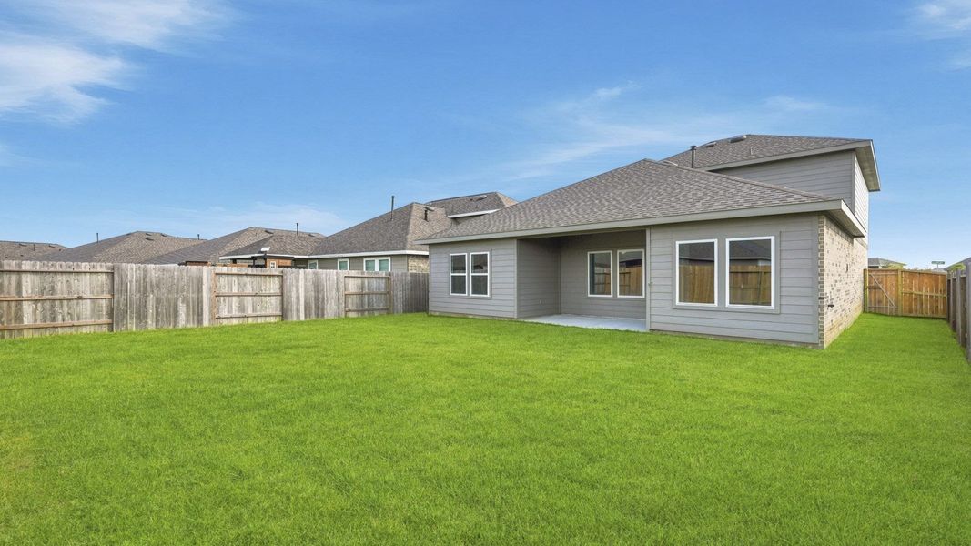 Exterior details and patio area of a home in River Ranch Trails, Dayton (Image 3).
