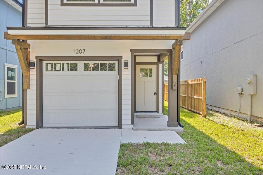 Front exterior of a new home in , Jacksonville, FL, highlighting curb appeal (Image 23).
