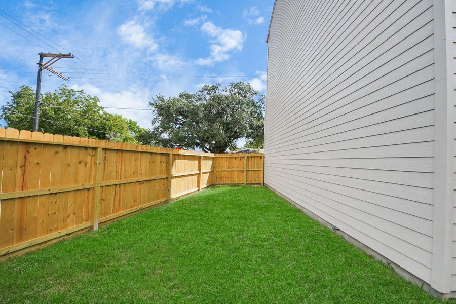 Exterior details and patio area of a home in , Houston (Image 23). Exterior details and patio area of a home in , Houston (Image 23).