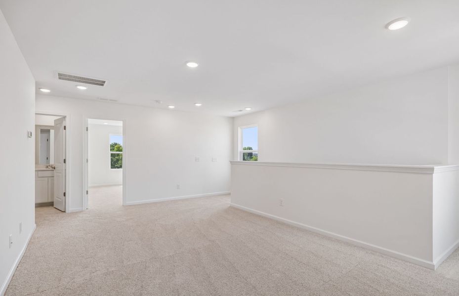 Spacious, unfurnished interior of a new home in Highlands of Carter's Station, Columbia (Image 32).