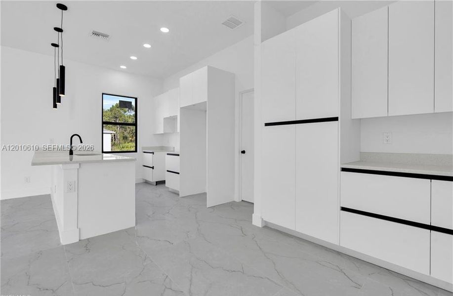 Furnished interior view inside a new home in , Lehigh Acres (Image 11).