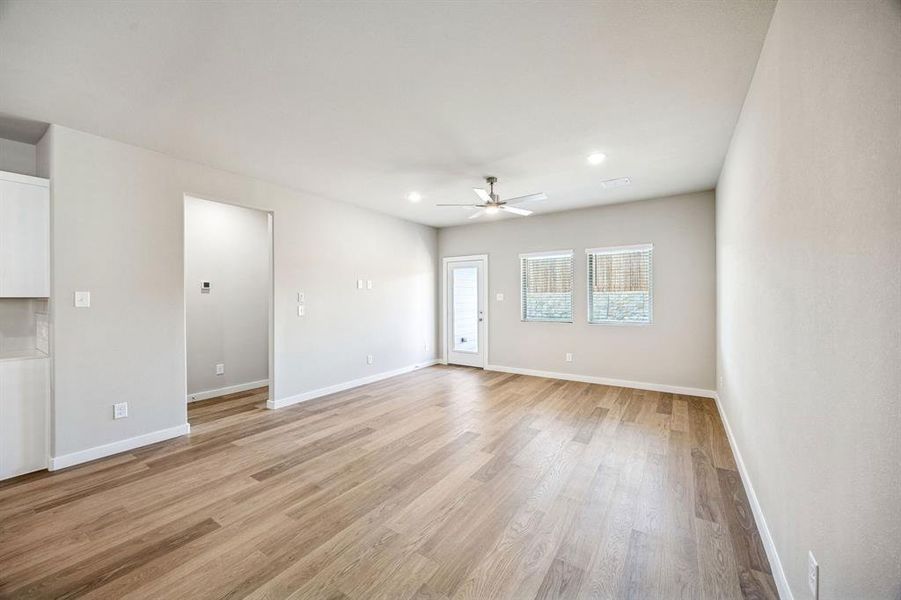 Living and Dining Room in the Willow home plan by Trophy Signature Homes – REPRESENTATIVE PHOTO
