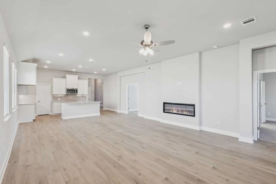 Representative unfurnished interior of a home built from the Denver by Chesmar Homes in Heartland 50's and 60's, Heartland (Image 7).