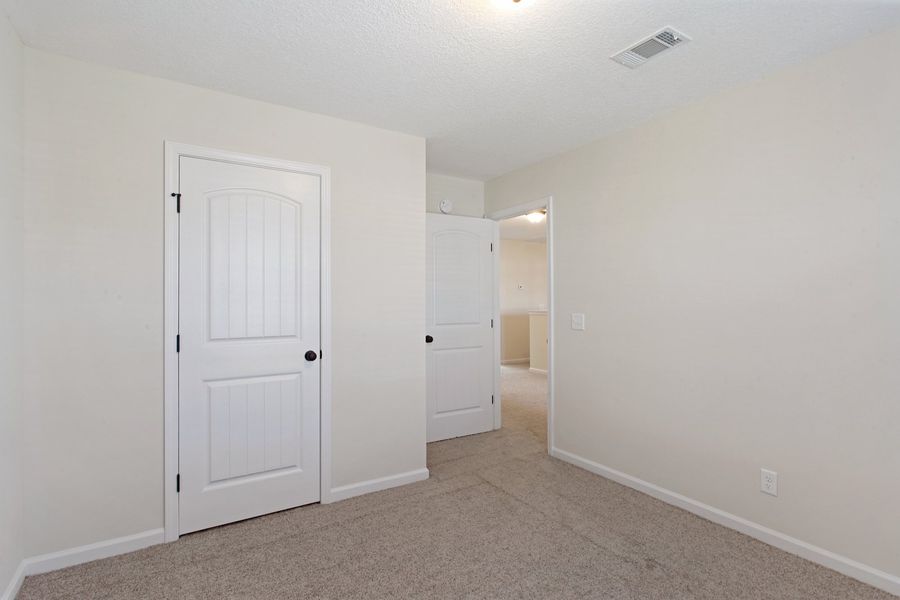 Representative unfurnished interior of a home built from the The Stacy by RTS Homes in Grand Reserve, Hinesville (Image 28).