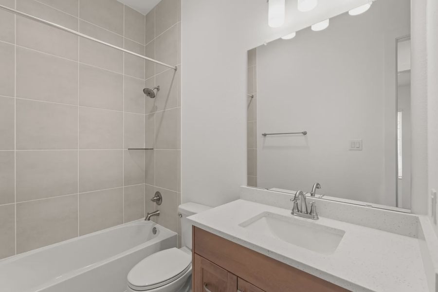 Representative furnished interior of a home built from the Mickelson by Chesmar Homes in Riceland Alley Loads, Mont Belvieu (Image 58).