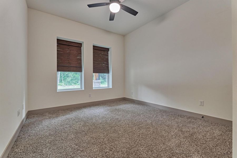 1st of the 3 additional bedrooms and situated on same side of house as primary suite