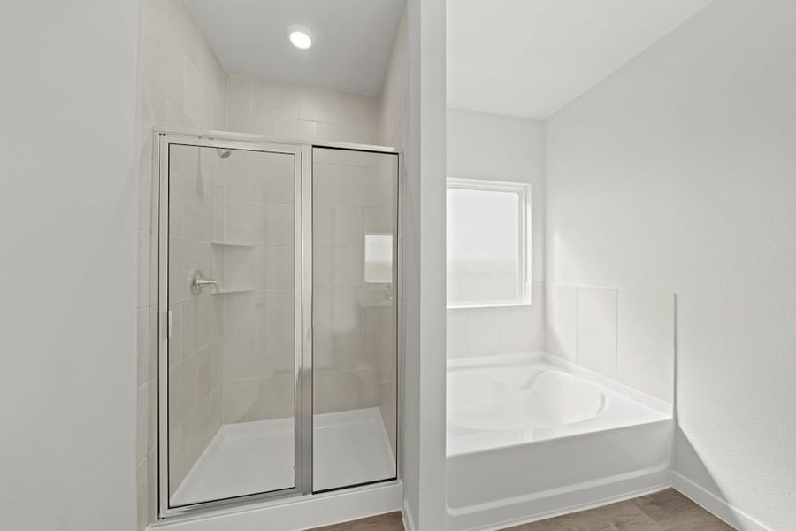 A bathroom with a glass shower.